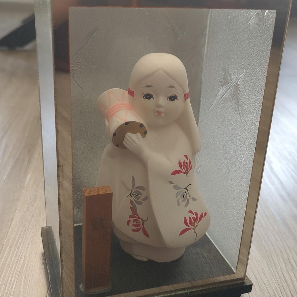 Porcelain Doll with Red and White Kimono